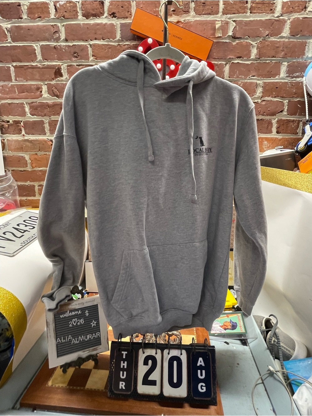 gray Local Boy Outfitters "Local 24/7" hoodie featuring the brand's signature ye